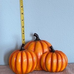 Three small pumpkins